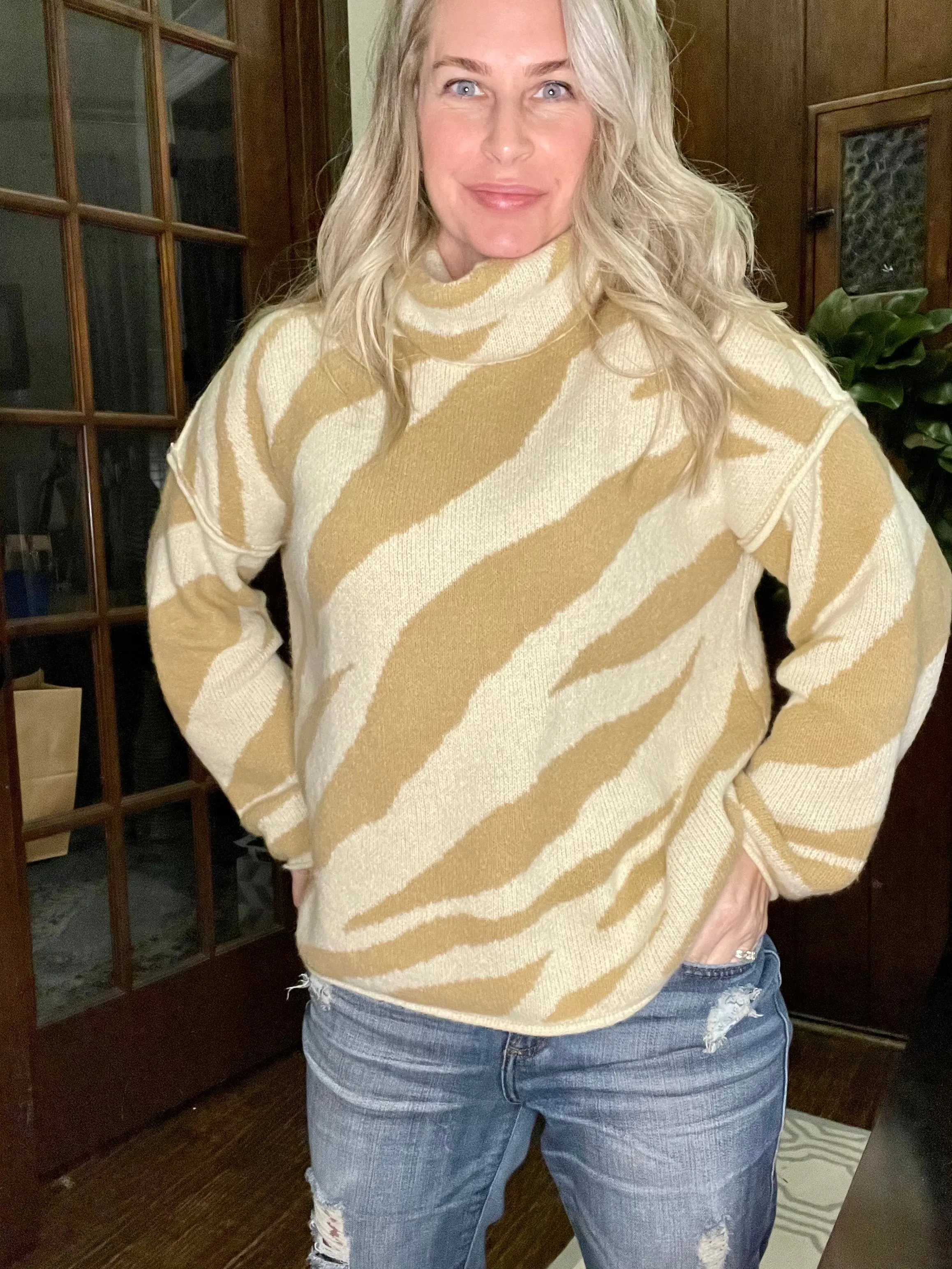 Zebra in Camel Sweater