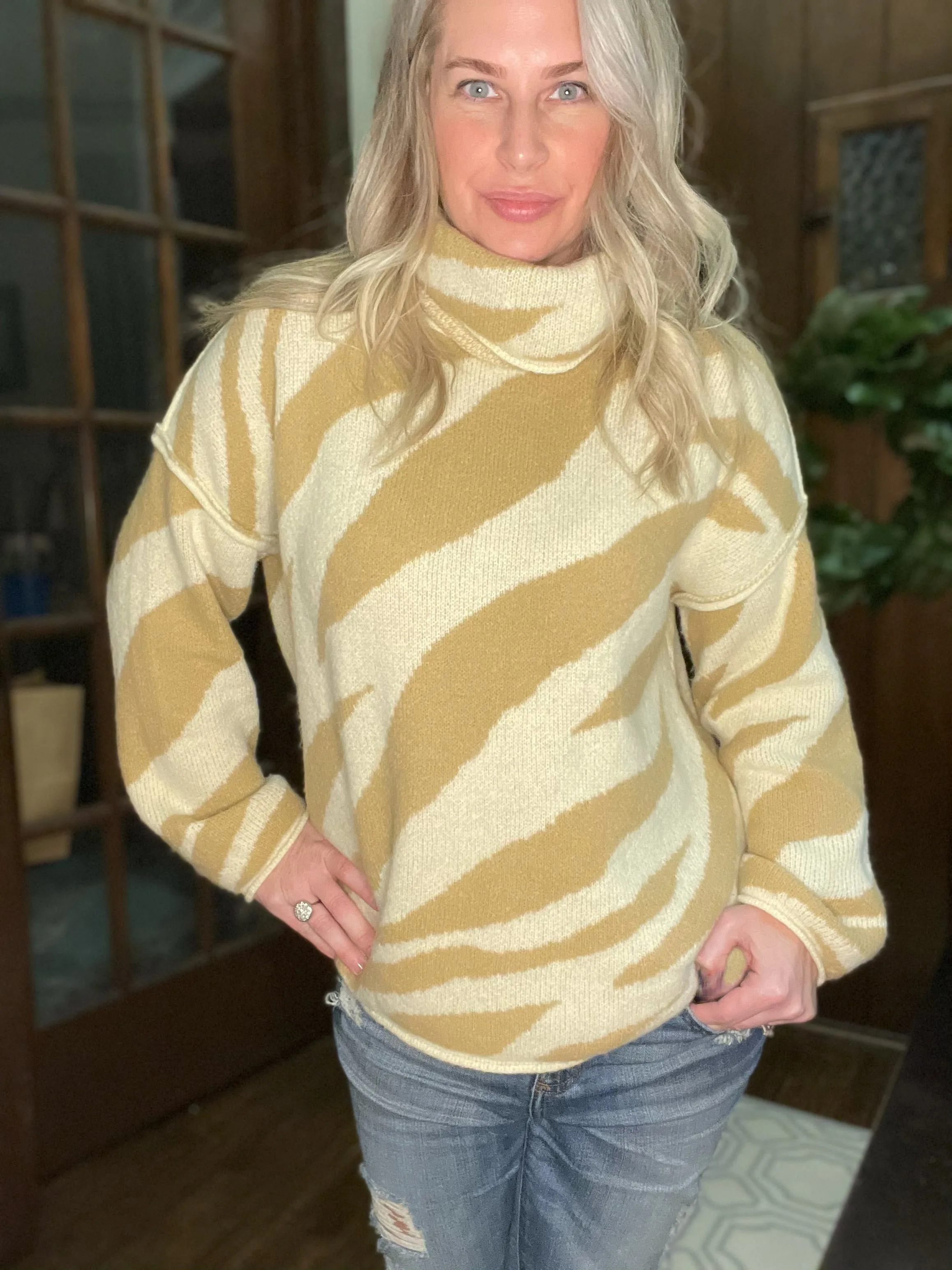 Zebra in Camel Sweater